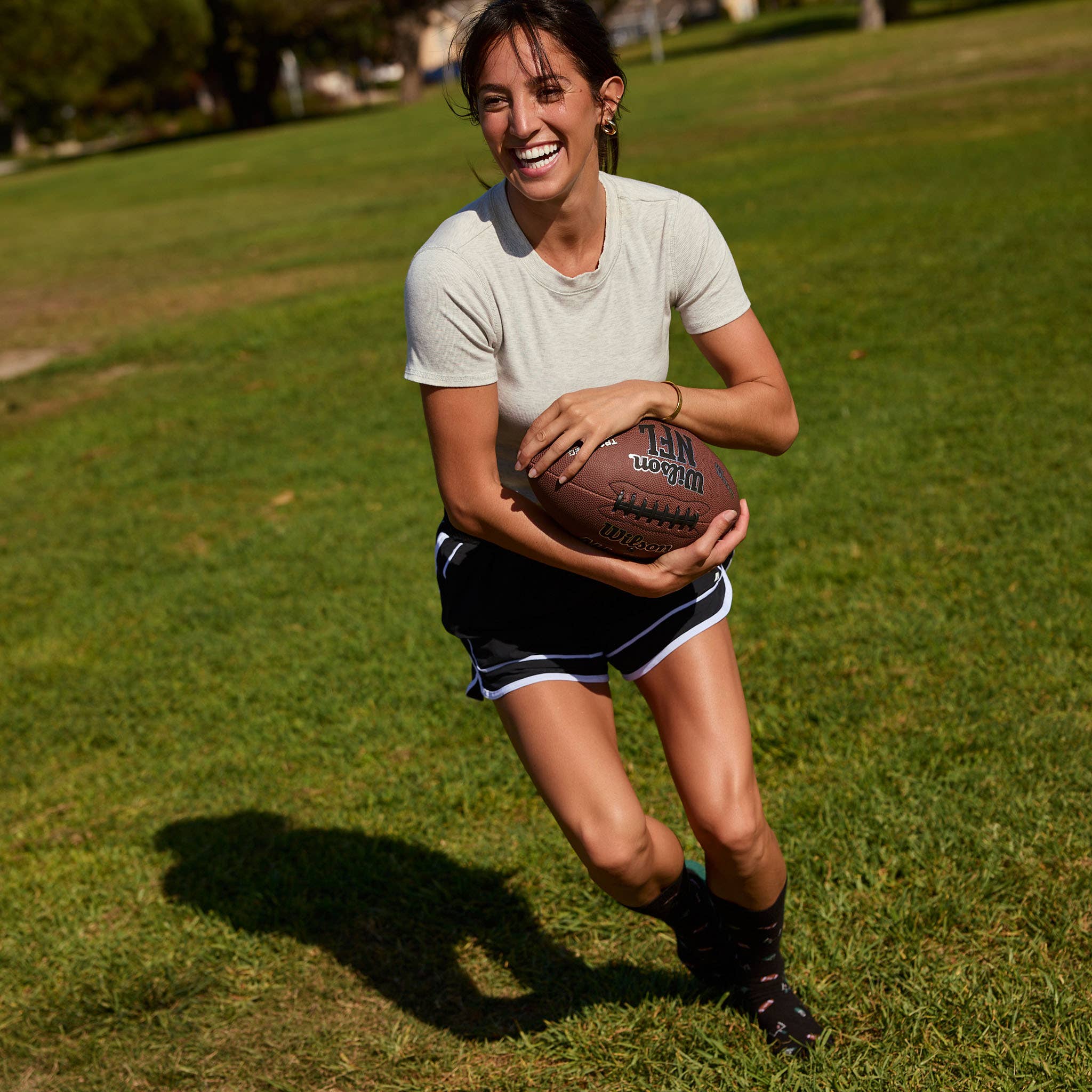 Socks that Support Youth Sports: Black Footballs