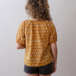 Flora Top- Malin Gold