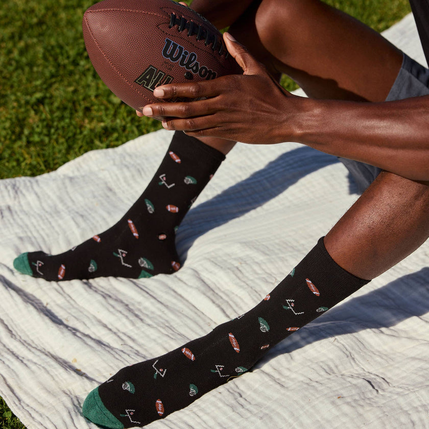 Socks that Support Youth Sports: Black Footballs