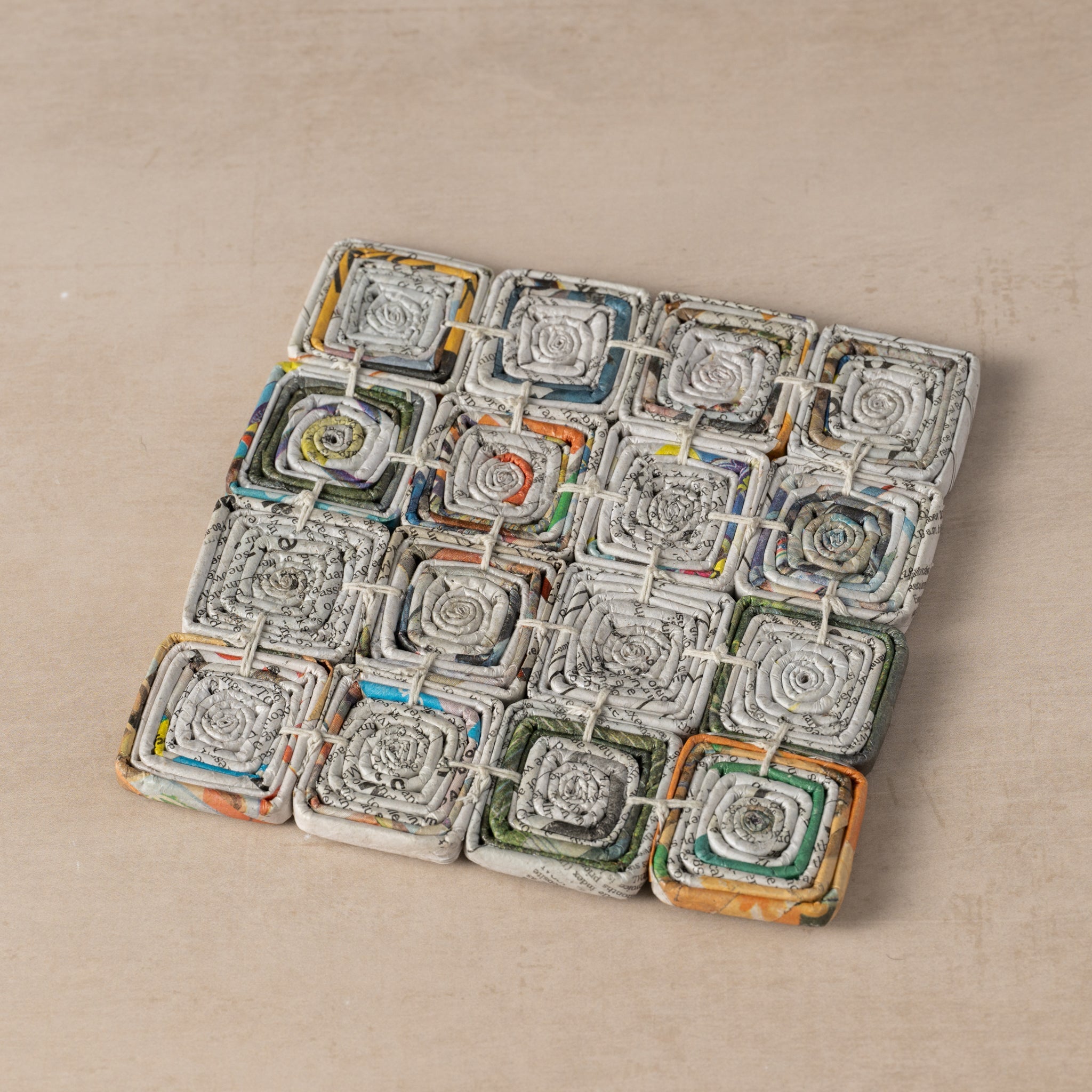 Read All About It Recycled Newspaper Trivet - Ten Thousand Villages