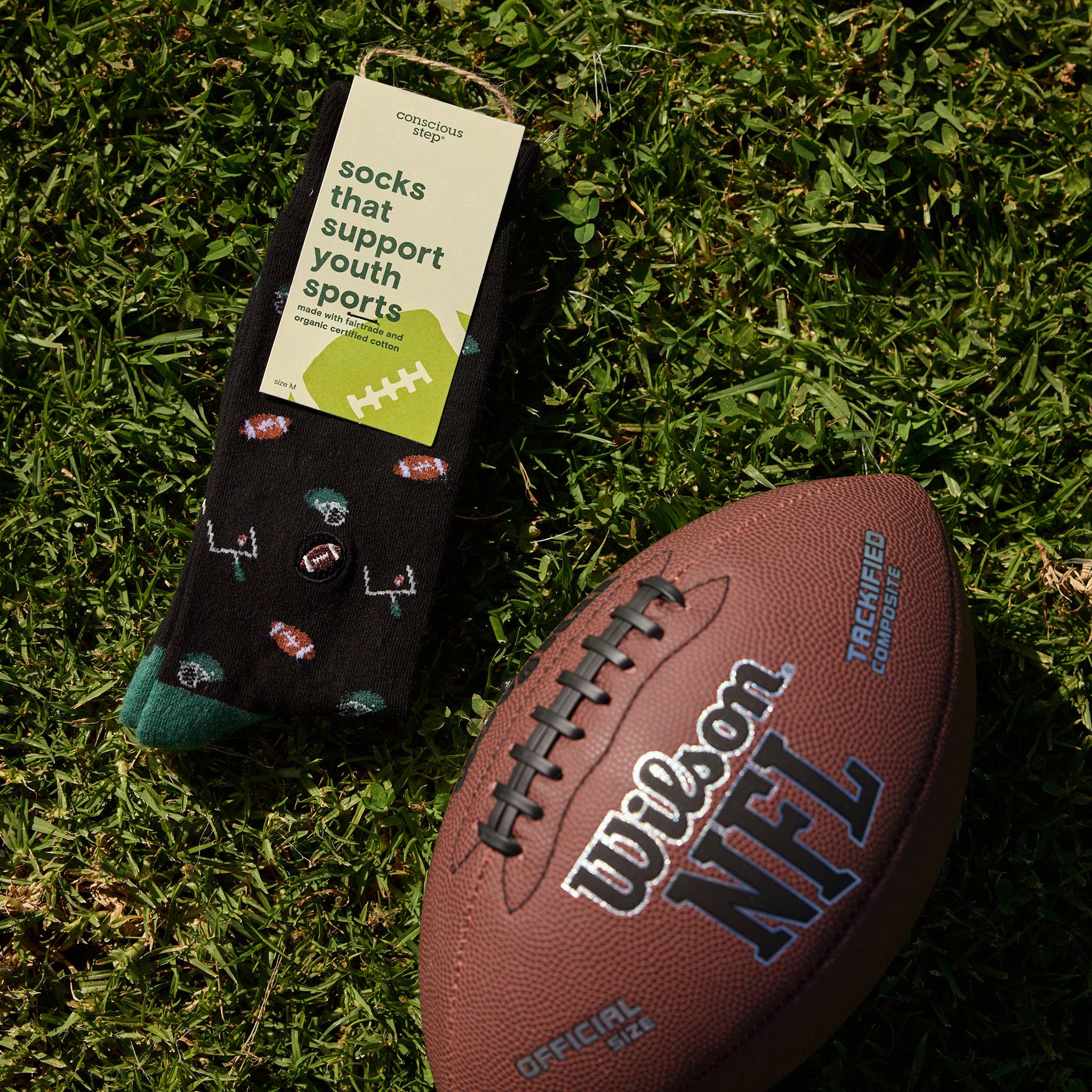 Socks that Support Youth Sports: Black Footballs